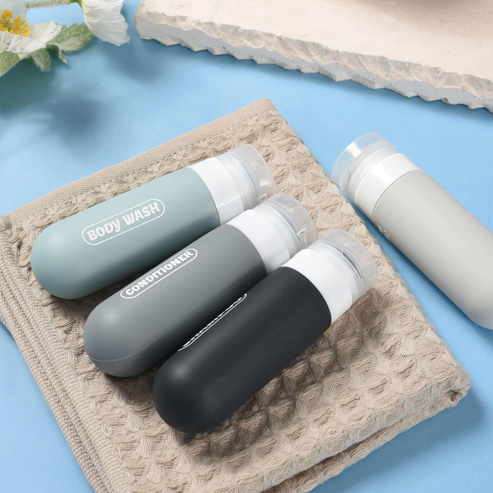 YNSHOUNA four-pack travel bottles with durable, reusable design.