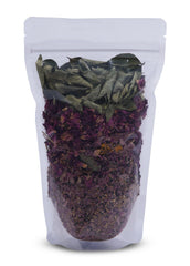 Application scene of Yogi’s Gift Herbal Hair Oil Mix ready for scalp massage.