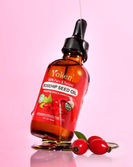 Close-up of Yoken Rosehip Oil being poured for fast absorption.