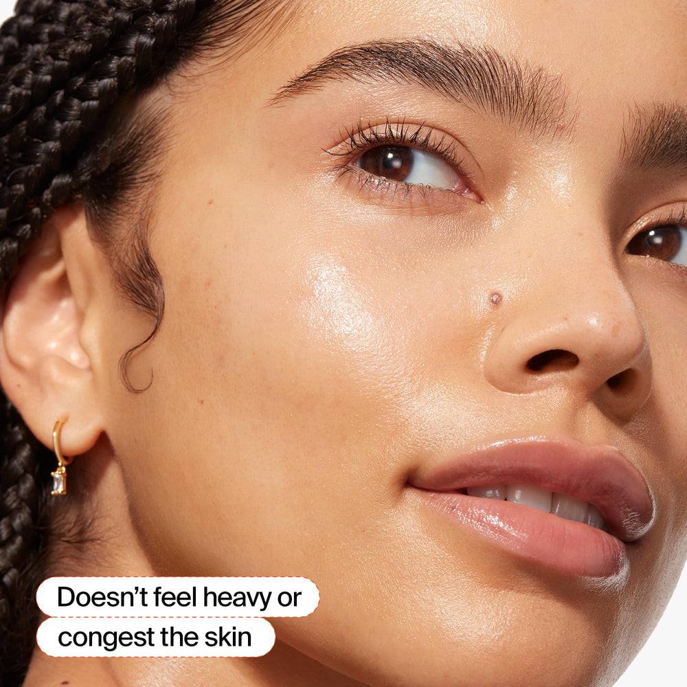 Youth To The People Superberry Hydrate Glow Face Oil being applied to skin