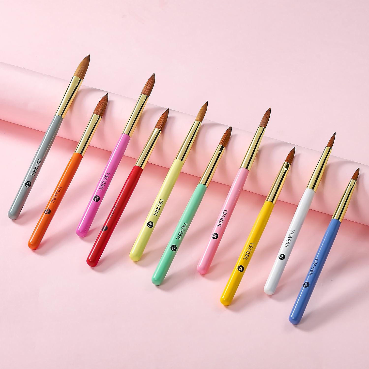 Yrarbil acrylic brush set in use for professional-level home manicure.