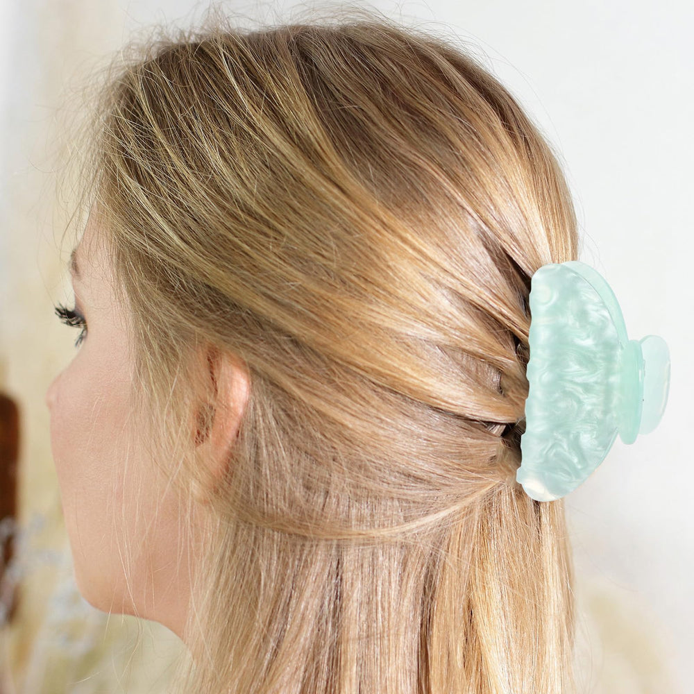 Pinza acrílica Yuxung amarilla para cabello, toque brillante y agarre seguro.