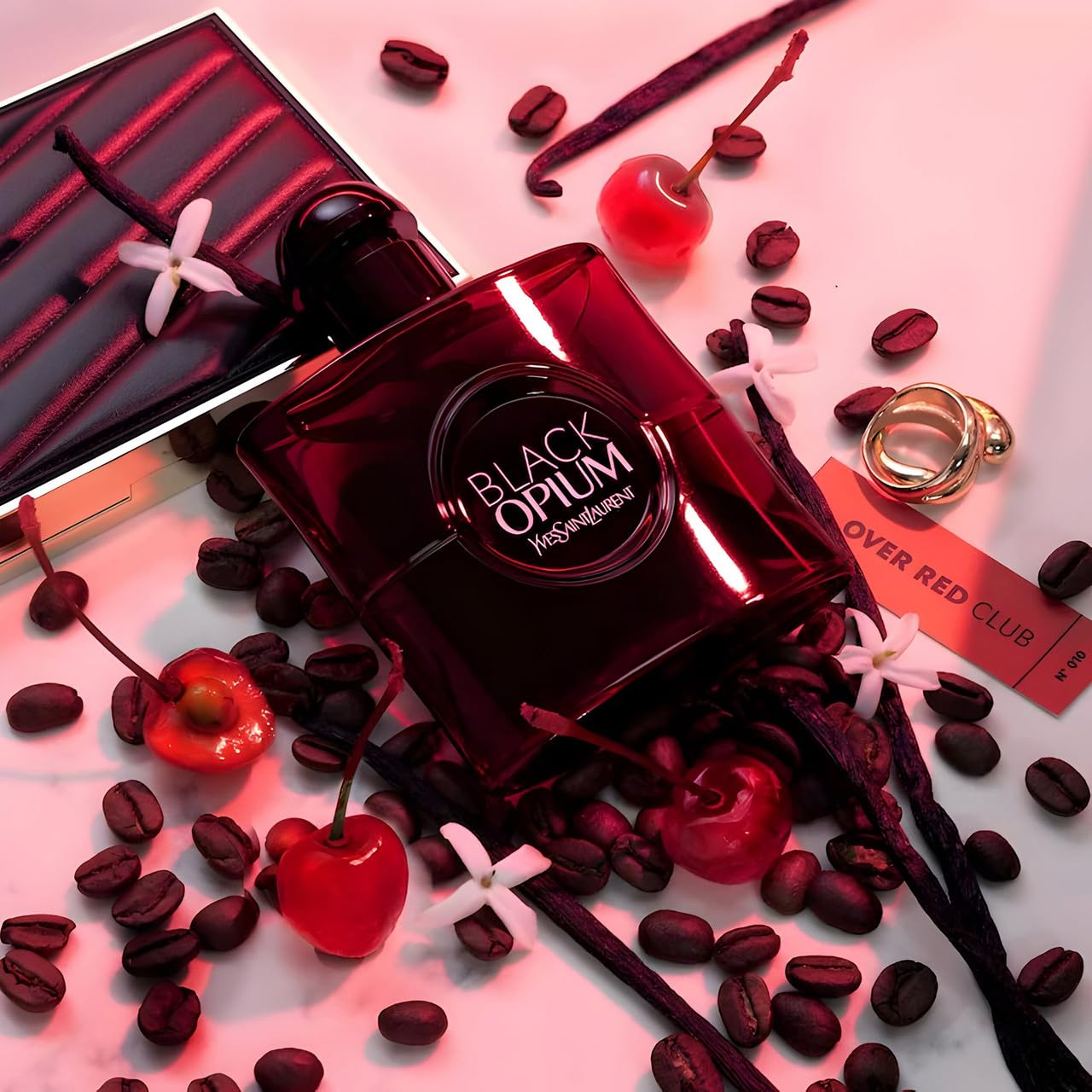 Yves Saint Laurent Black Opium Over Red cap closeup showing premium finish