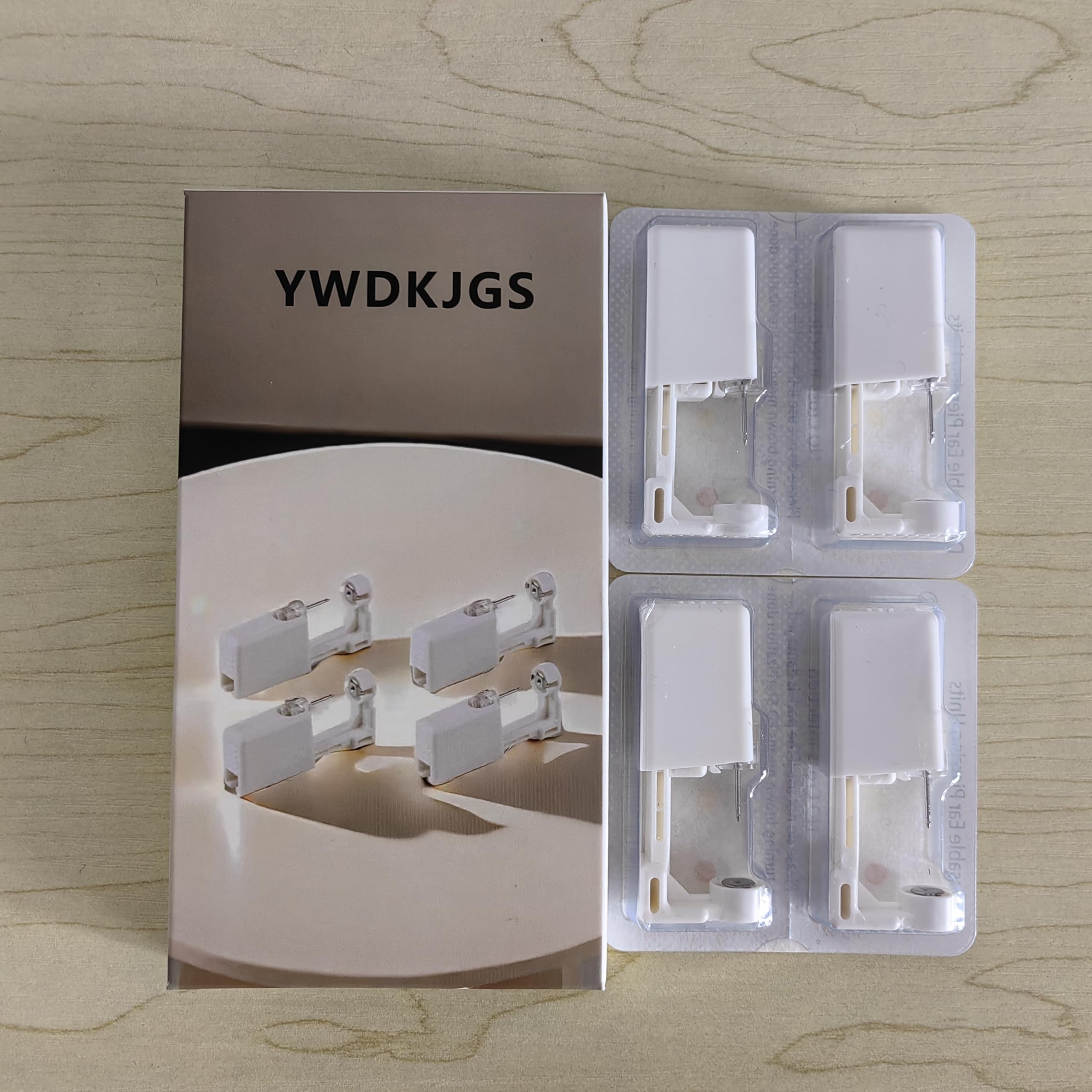 YWDKJGS spring-actuated design speeds and simplifies piercing.