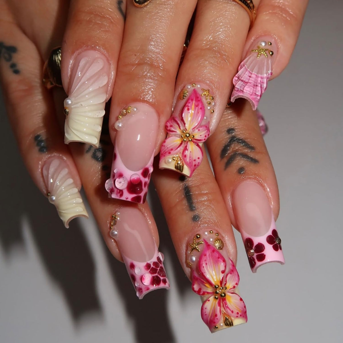 ZASKHLD floral press-on nails with pearl rhinestones for quick at-home glamour