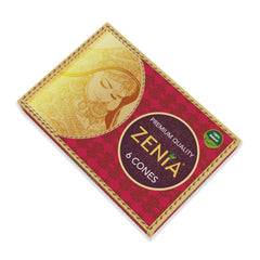 Zenia ready-to-use henna cone in use, simple tip-cut for control.