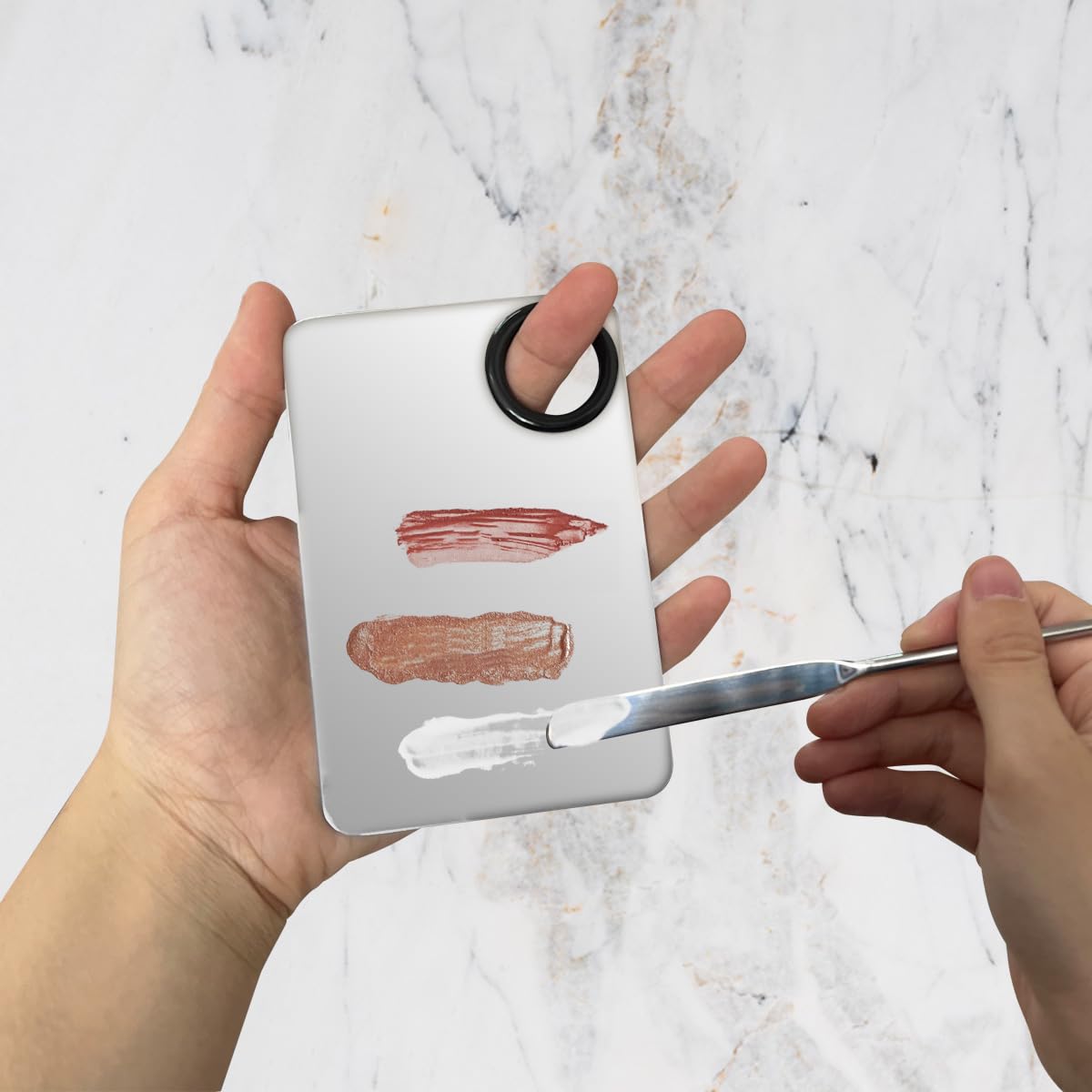 Paleta acrílica Zhuohai para ajustar tonos de base en casa.