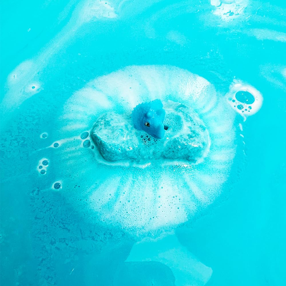Zimpli Kids large dino surprise bath bomb exposing the hidden toy inside.