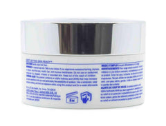Applying Complexion Renewal Pads to the face to reduce surface oil.