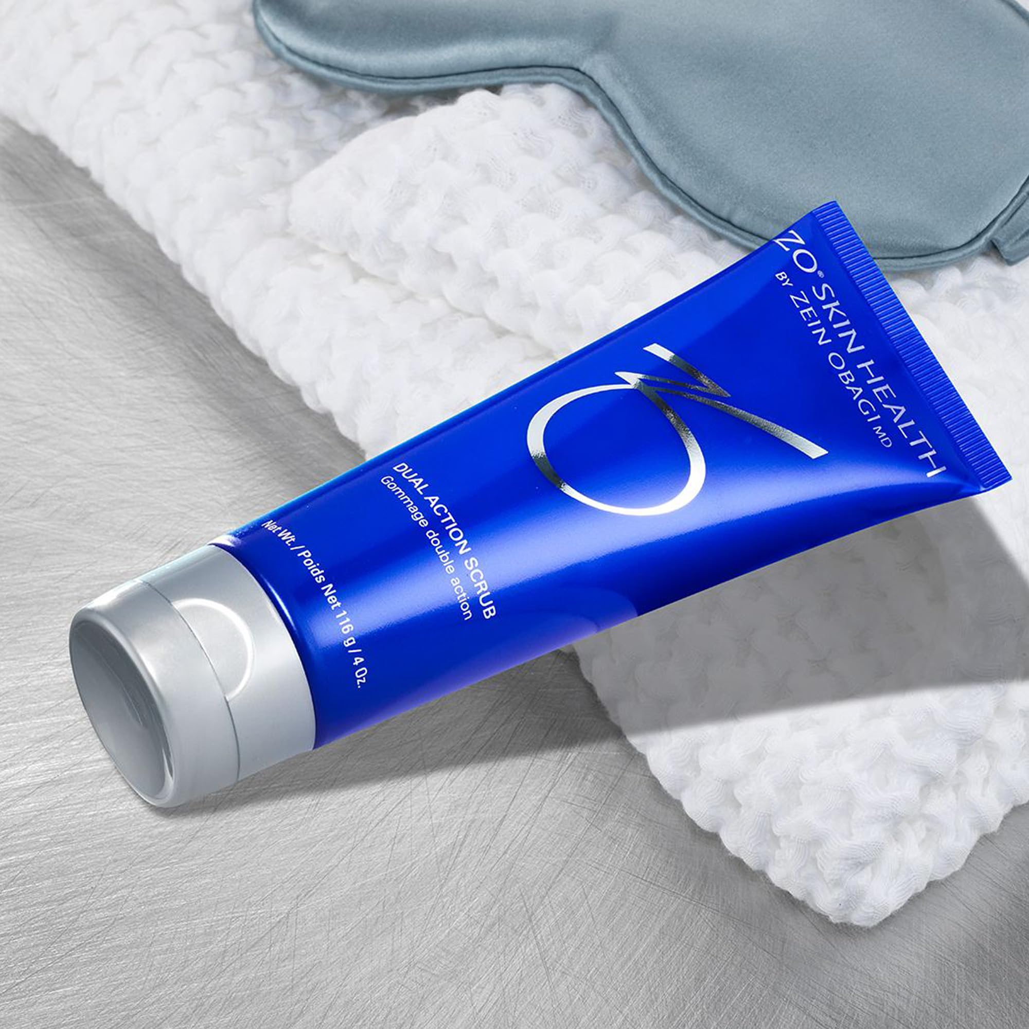 ZO SKIN HEALTH Dual Action Scrub applied to skin during routine.
