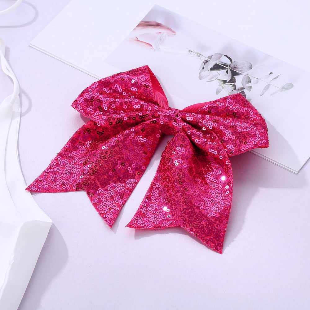 Zolyco bow clip hot pink worn on ponytail adds bright focal point