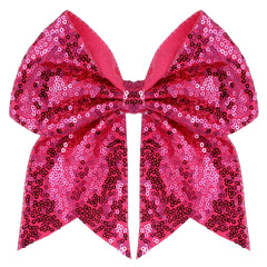 Zolyco large glitter bow clip hot pink close-up adds sparkling hair detail