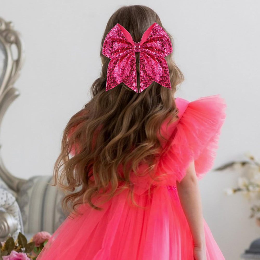 Zolyco sequin bow hair clip hot pink full shot elevates party-ready style