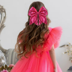 Zolyco sequin bow hair clip hot pink full shot elevates party-ready style