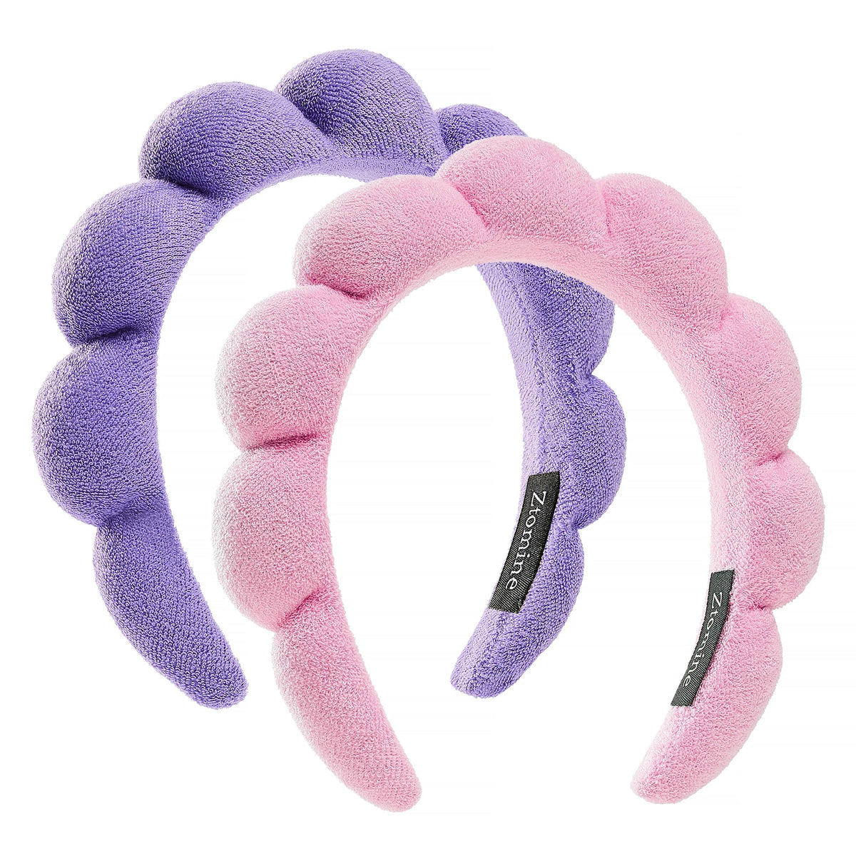 Diadema Ztomine Spa croissant rosado para mantener el cabello fuera del rostro durante la limpieza.